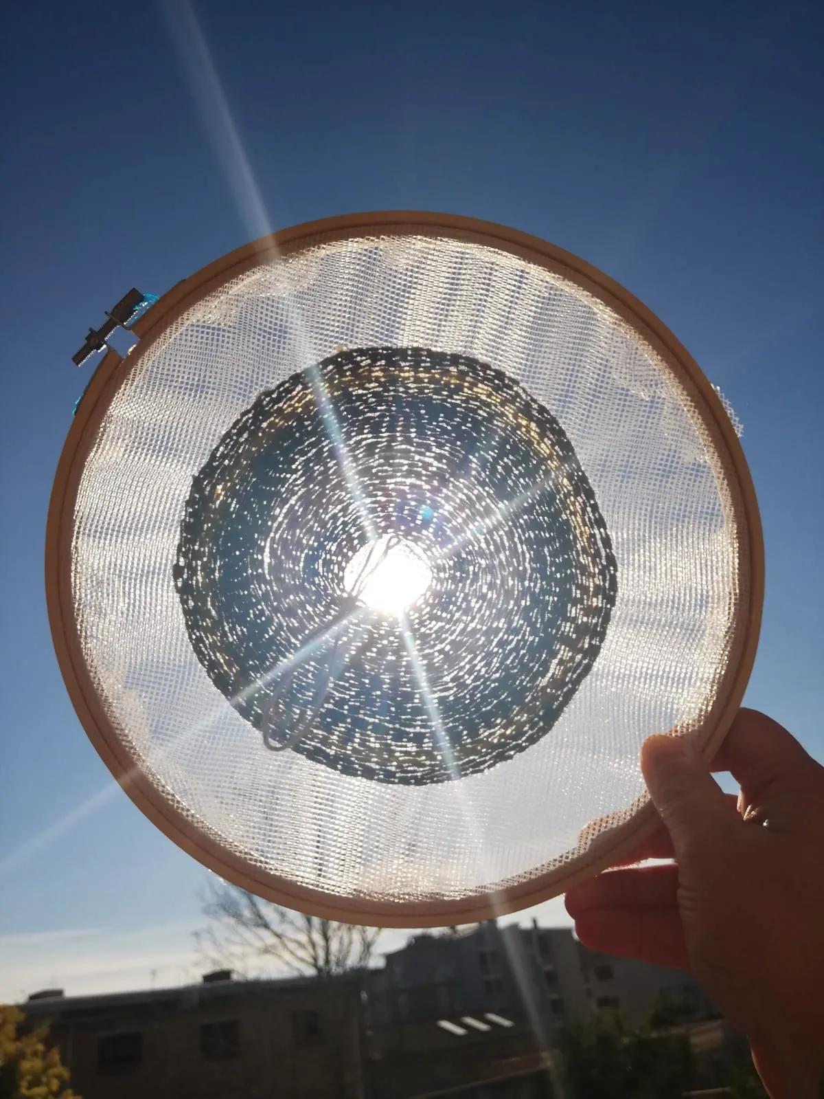 Signs from Another Dimension · Wool thread on thin net fabric, wooden hoop