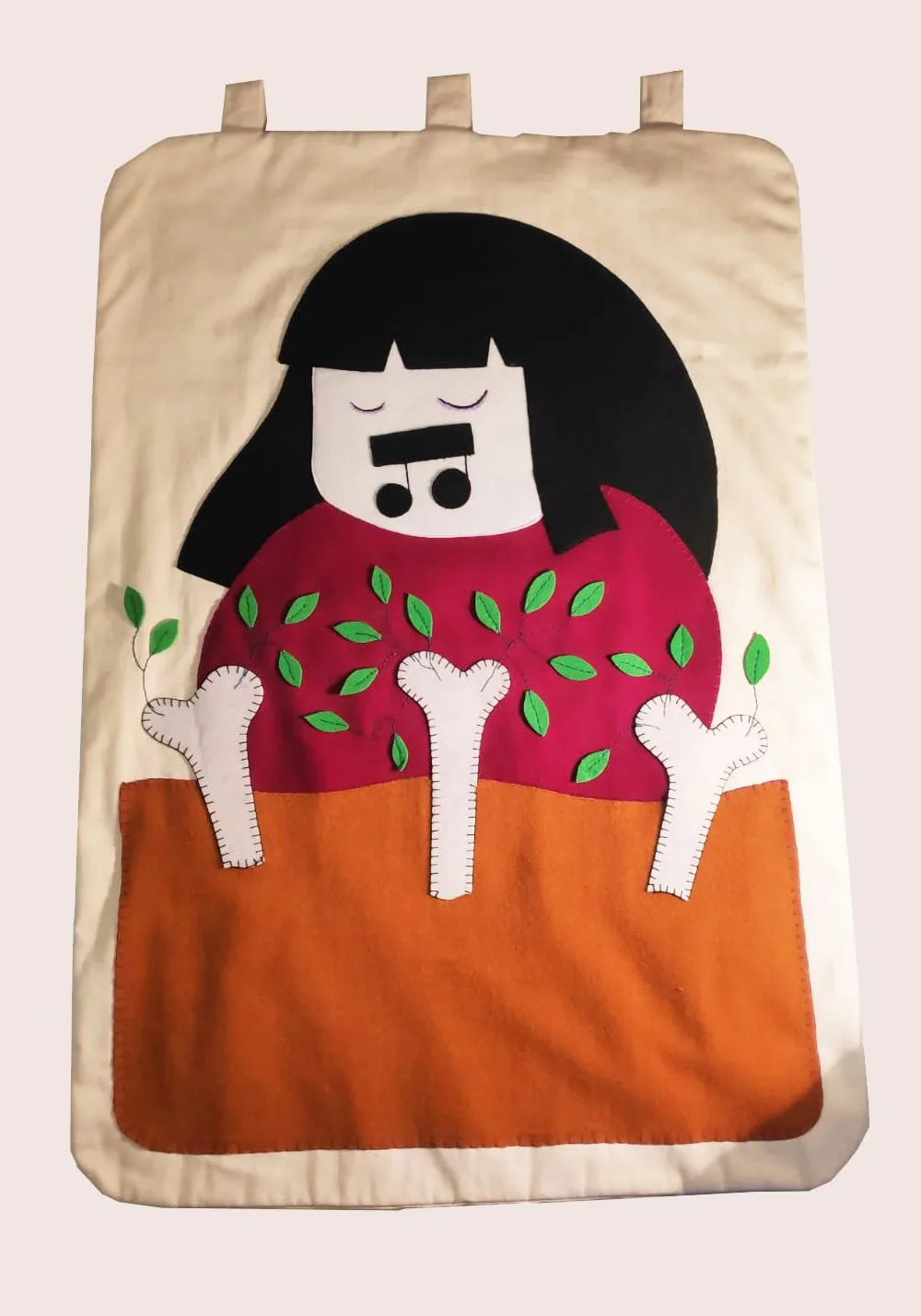 The Girl Who Sings to the Bones · Black fabric base with shaped, hand-sewn fabric appliqués, felt and embroidery