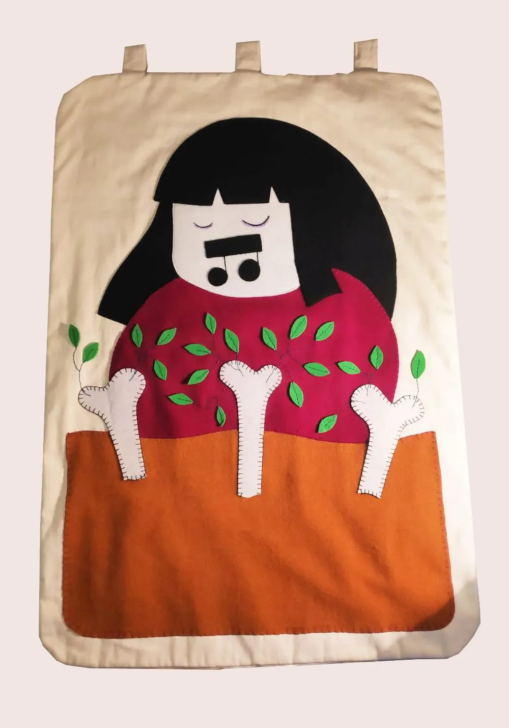 The Girl Who Sings to the Bones · Black fabric base with shaped, hand-sewn fabric appliqués, felt and embroidery
