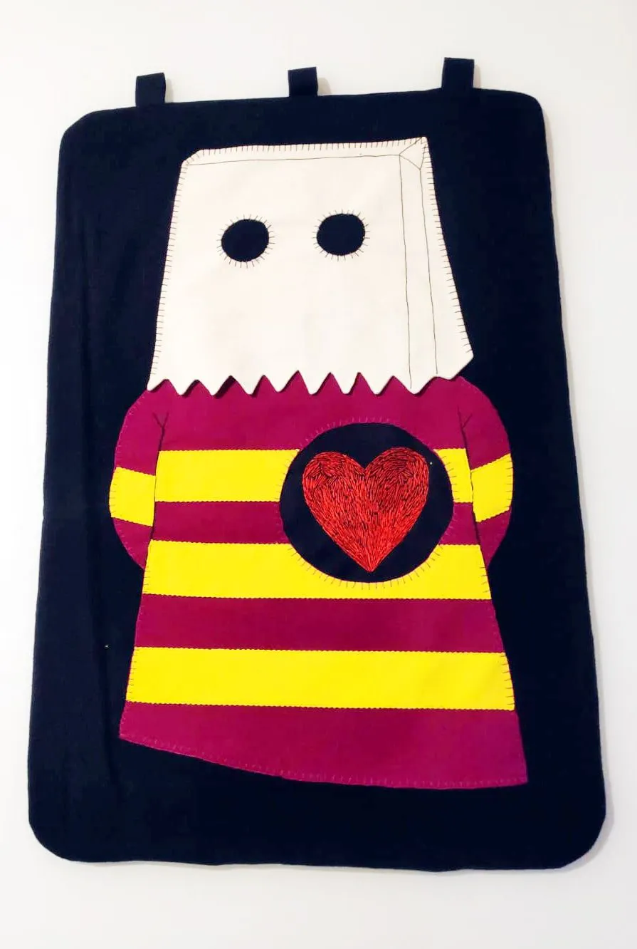 But.I.Am.Ashamed · Black fabric base with shaped fabric appliqués, hand- and machine-sewn